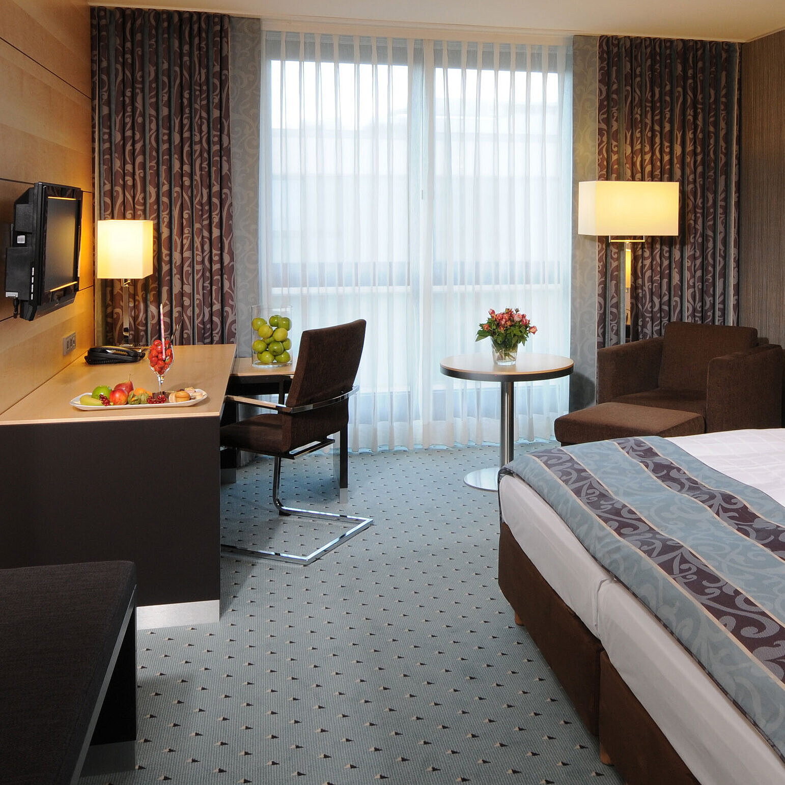 Superior room Superior room at Maritim Hotel Düsseldorf with stylish double bed, modern desk, cozy seating area, and fresh details.